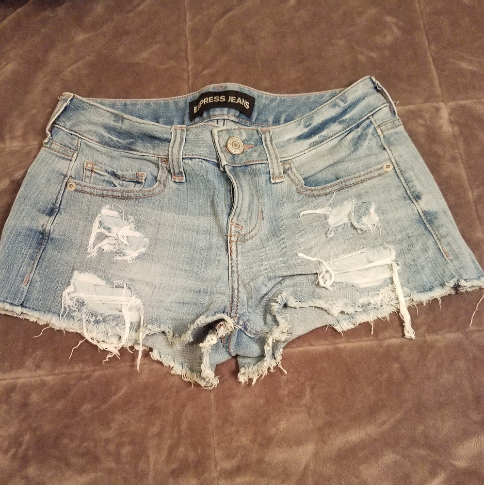Distressed mid rise shorts size 0